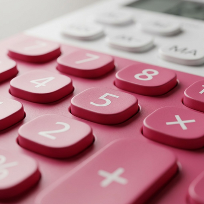 An extreme macro photograph showcasing the precise printing and varied keycap textures on the pink calculator keyboard.