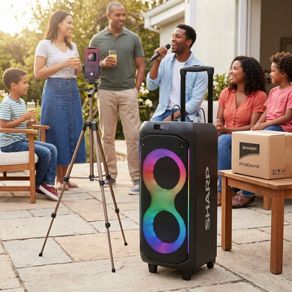 Sharp PS-935 portable party speaker with LED lights at an outdoor karaoke gathering with family.