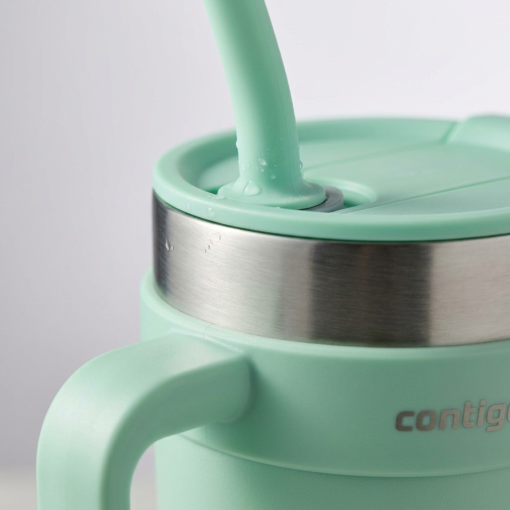 Extreme macro shot of the Contigo Streeterville tumbler, highlighting the steel texture and straw seal details.