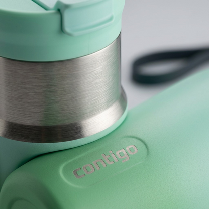 A macro photo of the Contigo Tween bottle, showing metal texture, the ombre finish, and the etched logo.