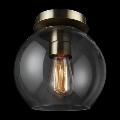 Plafonnier élégance dorée en laiton avec abat-jour en verre transparent